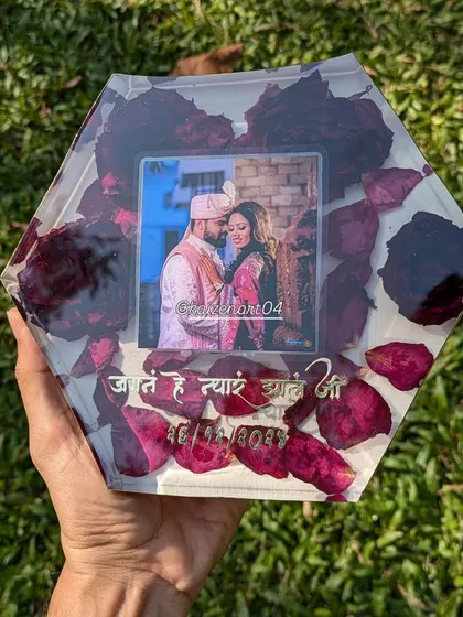 A beautiful 8x8 inch hexagon block preserving deep red roses. The piece is personalized with the couple's photo and a meaningful quote, making it a truly special keepsake.