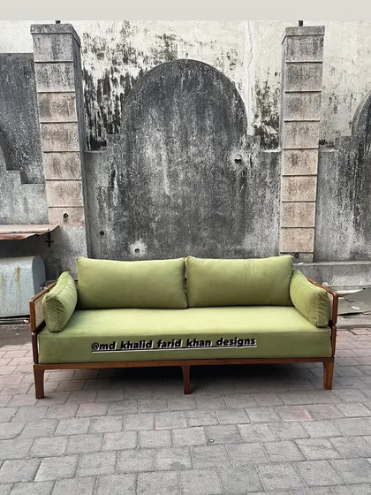 Front view of the green sofa.