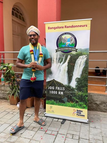 The joy of a finisher. This rider's smile captures the immense satisfaction of conquering the Jog Falls 1000K BRM and earning his medal.