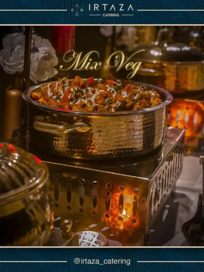 My classic Mix Veg, a colorful and flavorful medley of seasonal vegetables in a rich gravy. Served in a gleaming golden pot, it's a vegetarian staple that always pleases a crowd.