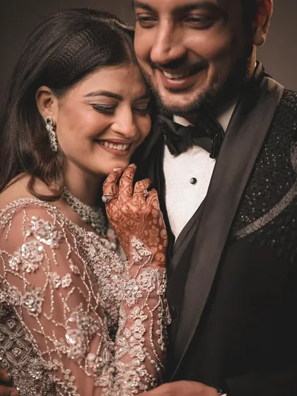 This is what it's all about. A candid moment of pure happiness, where a shared laugh says more than words ever could. I focus on creating a comfortable space where your genuine connection shines through.