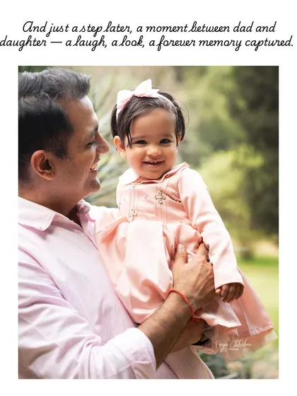 A laugh, a look, a forever memory captured. A father shares a joyful moment with his daughter during her first birthday photoshoot in the park.