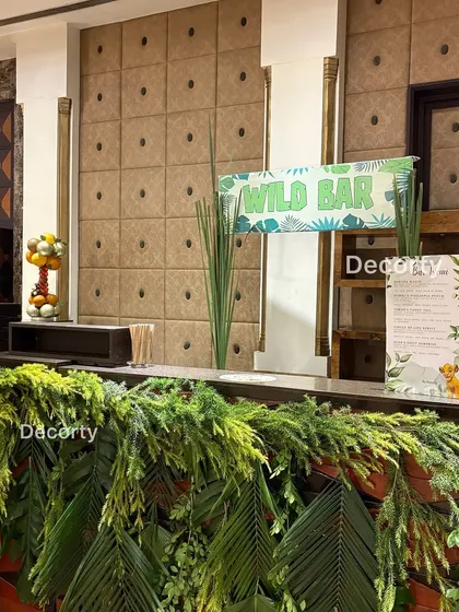 Another perspective of the lush "Wild Bar," ready to serve refreshing drinks to party guests.