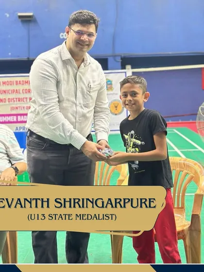 Revant Shringarpure, a U13 State Medalist, being recognized for his achievements at the start of our summer camp.