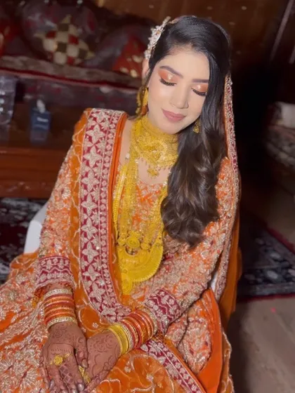 My mehendi work on a beautiful bride. Even from a distance, you can see the richness of the henna stain, which adds so much to her overall bridal glow.