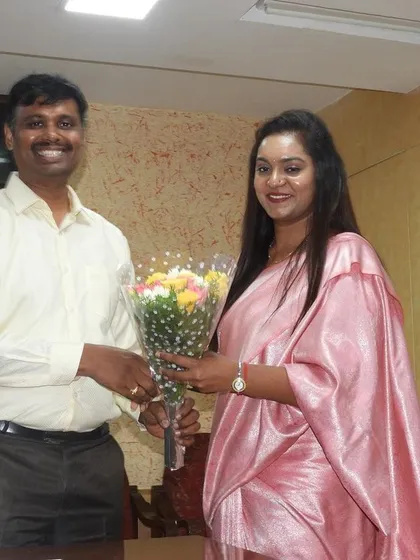 Receiving a token of appreciation at the audit workshop. This work keeps my financial skills sharp, directly benefiting the restaurant financial planning services I offer.