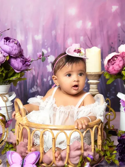 Another beautiful shot from the enchanting purple floral theme, capturing a curious look.