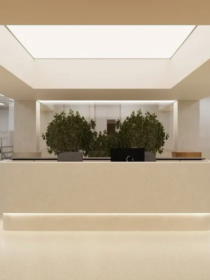 The main reception desk of the ICU is designed to be welcoming yet professional. A large skylight and integrated planters introduce natural elements right at the entrance, setting a serene tone for families and visitors from the moment they arrive.