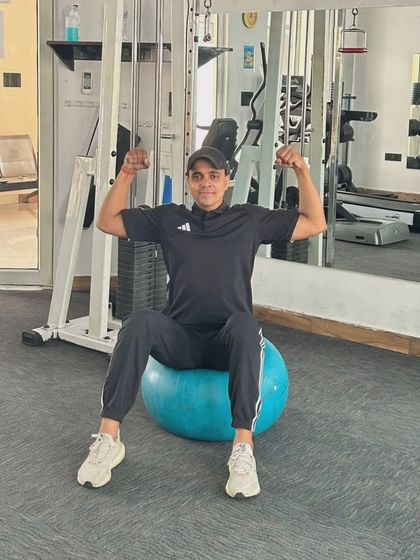 Showing off the results of dedicated core and strength training.