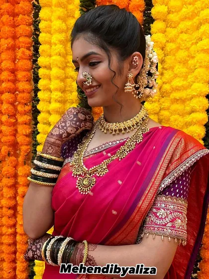 A beautiful portrait of Rumani Khare with her bridal mehendi.