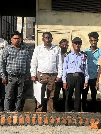 Our architect Megha Laddha with the construction team at the 'Dream City Chambers' site. An architect's role is to be the connecting point, guiding and motivating the team to execute the design details correctly.