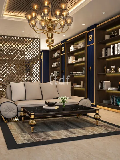 Maximalism is not just about excess; it is about the intricate beauty of details. This room blends a maximalist spirit, seen in the ornate chandelier and jali screen, with a serene, minimalist color palette, achieving a perfect harmony of opulence and simplicity.