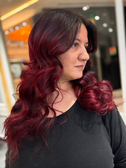 Another view of the red-violet hair, showing the beautiful curls and the richness of the shade.