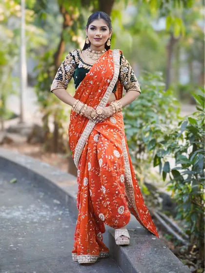 A full length shot of the modern Nauvari drape. This style is perfect for brides who want a traditional yet fashionable look.