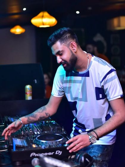 A slight smile while I'm deep in the mix. Even when I'm concentrating, I'm enjoying every second of the process and feeling the music.