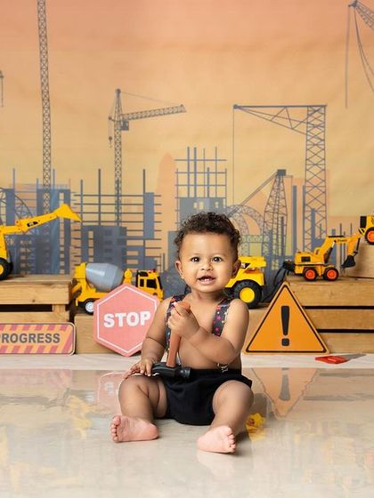 Ready for some serious fun at his construction-themed first birthday. This setup is perfect for little ones who love trucks and getting their hands dirty.