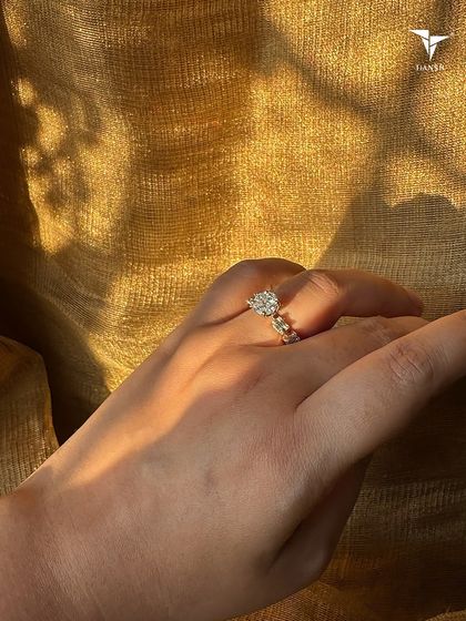 For the woman who turns even golden hour into her spotlight. This ring features a bold mix of accent diamonds and sleek metal for a modern, sophisticated look.
