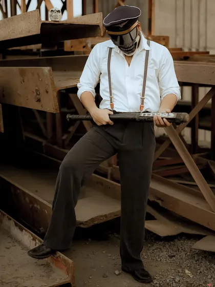 A different angle from the skull mask shoot, creating a more menacing and mysterious mood.