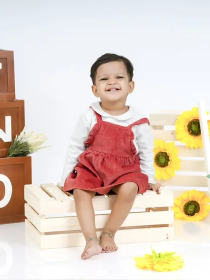 Celebrating year two! This bright and cheerful sunflower-themed shoot is perfect for a toddler's second birthday.