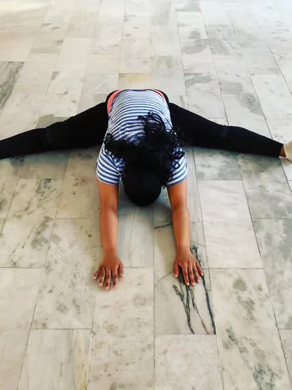 Working on my center splits. Consistent practice is the only way to improve, and I bring this same patient and persistent approach when I'm teaching a new routine to a group.