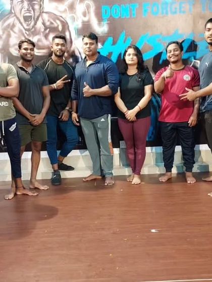 The team at Ultimate Gym. This is our den, where we build our strength.