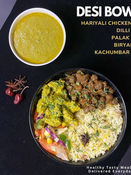 This Desi Bowl features Hariyali Chicken Tikka for a fresh, herby flavor. Paired with Dilli Chole, Biryani Rice, and Palak Gravy, it's a complete, nutritious, and delicious meal.