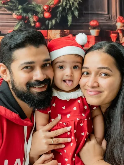 I always encourage parents to join in for a few photos. This family portrait from a Christmas mini-session captures the warmth and joy of the holiday season, creating a memory the whole family will cherish.
