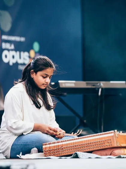 A student performs on the santoor, a beautiful Indian classical instrument, at Art Mumbai. We proudly offer lessons in both Western and Hindustani music.