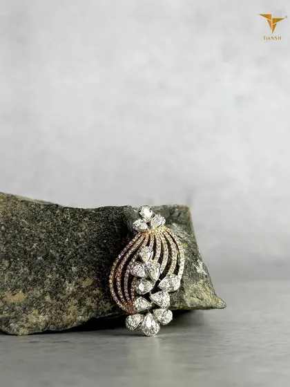 Diamonds shaped like petals, curves shaped with intention. This elegant diamond pendant is crafted to sit beautifully, wherever you wear it.