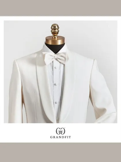 An exquisite choice for a groom or a standout formal event. This white tuxedo jacket, crafted from premium linen with a soft shawl collar, redefines wedding and ceremonial elegance.