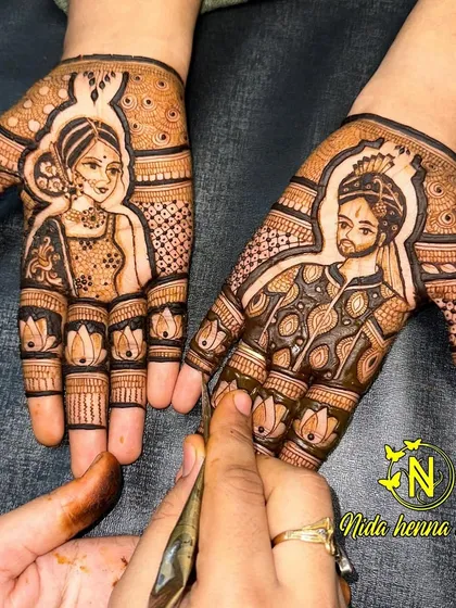 A portrait figure demonstration for my students. This design shows a classic bride and groom, with lotus motifs on the fingers, highlighting the core techniques of figurative mehandi.