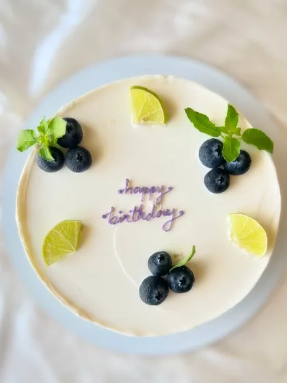 My most popular creation, the signature Italian Lemon & Blueberry cake. I offer many design variations, all featuring fresh blueberries, zesty lime, and smooth buttercream.