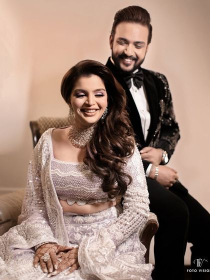 Arshi and Ashish share a laugh during their sangeet. The bride is radiant in her Manish Malhotra lehenga, a detail we make sure to highlight for our fashion conscious clients.