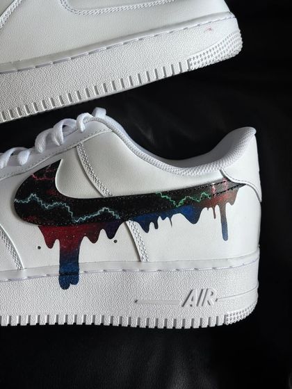 A close-up of the galaxy drip swoosh, showing the blend of colors.