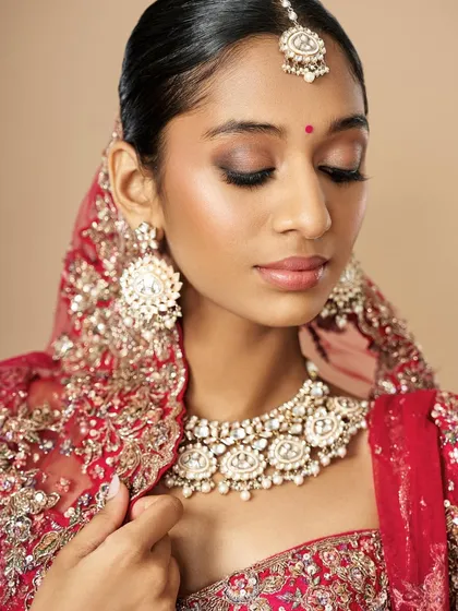 A classic bridal look featuring a soft brown smokey eye and fluttery lashes. The skin is kept luminous to give that healthy, glowing-from-within look.
