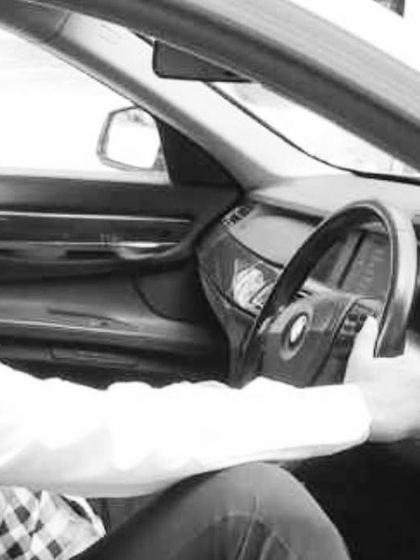 A side profile while driving. My focus is always on the road ahead, both literally and in my legal practice.