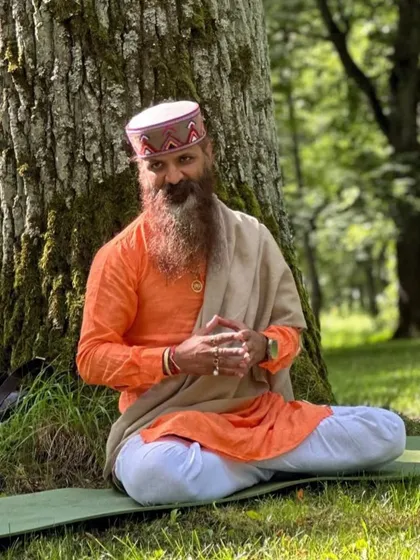 Teaching under a tree, the original classroom for yogis. Nature provides the perfect environment for spiritual practice, reminding us of our connection to all of life.