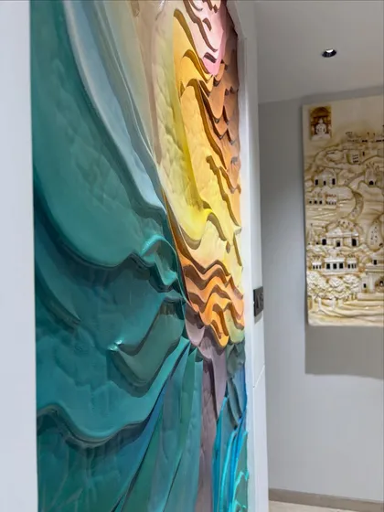 A side view emphasizing the 3D nature of the wave painting. The layers are built up to create a real sense of depth and movement.