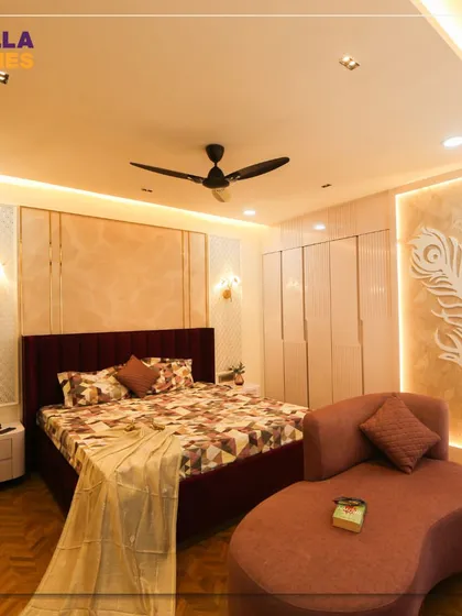 This angle shows the balance of textures in the room, from the patterned headboard wall to the sleek wardrobes and the warm wooden flooring, all illuminated by layered lighting.