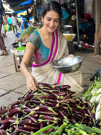 The vibrant colors of the local market in Mysore. Picking out fresh brinjals for a delicious plant-based meal. Supporting local farmers is a key part of my food philosophy.