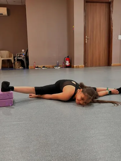 Our students are always growing. These images capture their progress in flexibility and technique, from deep splits to high extensions at the barre, with guidance from our teachers.