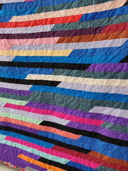 A close-up of the colorful diagonal stripes.