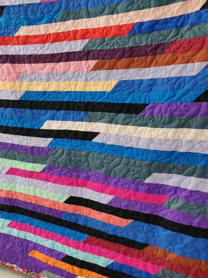 A close-up of the colorful diagonal stripes.