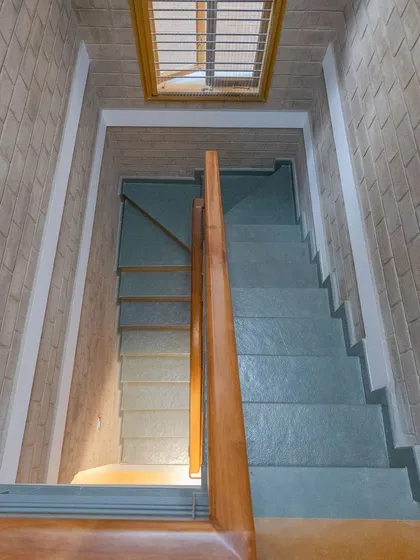 Looking down the main staircase, showing the play of light and shadow.
