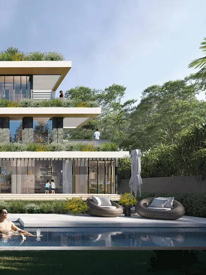 For this luxury villa in Mumbai, we blurred the lines between inside and out. The design uses expansive glass walls and terraced green roofs to connect the family with nature, creating a private oasis in the heart of the city.