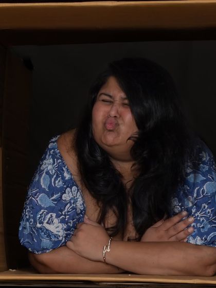 A hilarious and expressive portrait of one of the participants from the "in the box" shoot. It's all about having fun!