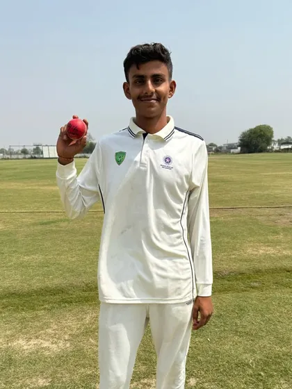 Parnit Tiwari holds the ball after a destructive spell where he took 8 wickets for just 1 run. This is the kind of match-winning performance our program aims to produce.