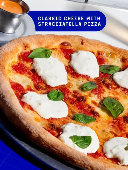 Our Classic Cheese with Stracciatella Pizza is a simple masterpiece. A rich tomato base, aged mozzarella, and fresh basil, topped with creamy dollops of stracciatella.