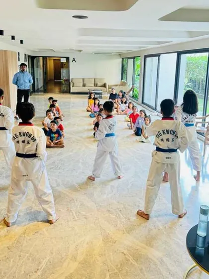 A view from behind the students as they practice their stances. This shows the organized and disciplined nature of our classes.