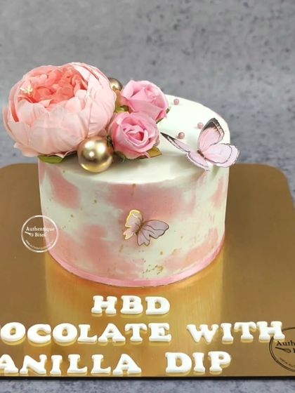 Another version of our popular butterfly floral cake, perfect for birthdays, anniversaries, or any special occasion.